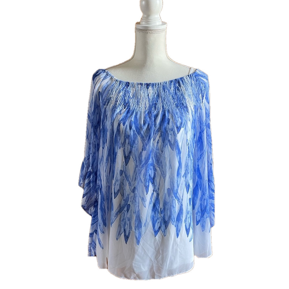 Alfani 0x top with white tank attached.